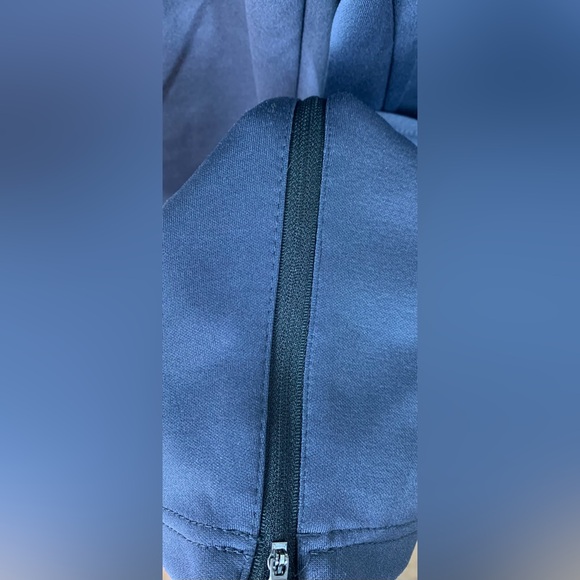 Reebok Dark Gray Stretchy Soft Track Pants. 3 pockets.  Zippers at leg base. - Picture 8 of 13